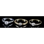 Three Diamond Solitaire Rings, one in platinum mount, set with a brilliant cut white diamond,