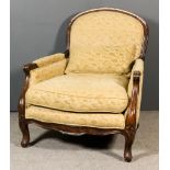 A French Walnut Framed Easy Chair of Large Proportions, with arched and moulded showwood frame,