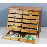 A 19th Century Collectors Mahogany Cabinet, with square top edge, fitted twelve small drawers