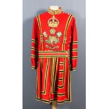 A Rare Yeoman Warder's "Tudor State Dress", worked in gold and coloured threads on a red ground
