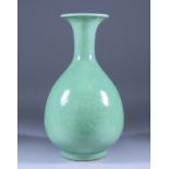 A Chinese Celadon Yuhuchunping Vase in Ming Style, carved with chrysanthemum, 13.5ins (34.3cm) high