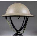 A World War II British Steel Helmet, the under rim stamped "VB56 5SLN"