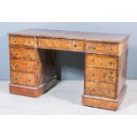 A Victorian Figured Walnut Kneehole Dressing Table, with recessed front and moulded edge to top,