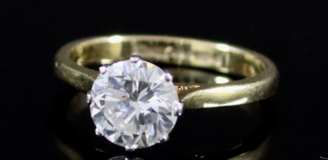 A Solitaire Diamond Ring, Modern, in 18ct gold mount, set with a round brilliant cut diamond,