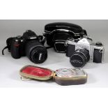 A Nikon D60 Digital Camera with Nikon DX 18-55mm Lens, an Asahi Pentax S1a 35mm SLR camera, No.