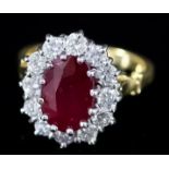 A Ruby and Diamond Ring, Modern, in 18ct yellow gold mount, the centre set with a ruby,
