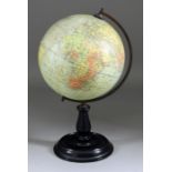 A Philips' "British Empire Globe", Circa 1932, with brass axis, on ebonised turned wooden base,