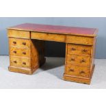 A Victorian Pollard Oak Kneehole Desk, by Howard & Sons of Berners Street, London, with red tooled