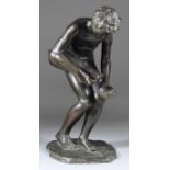 Antonio Ugo (1870-1956) - Dark green patinated bronze of a stooped young male water carrier, 17.5ins