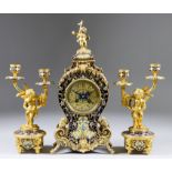 A Late 19th/Early 20th Century French Gilt Brass and Champleve Enamel Three-Piece Clock Garniture of