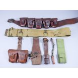 A Collection of World War I Leather Items, including ammo pouch belt with five pouches, bayonet
