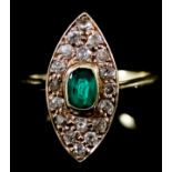 An Emerald and Diamond Ring, 20th Century, in 18ct gold mount, the oval face set with a central