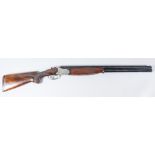 A 12 Bore Over and Under Shotgun by Lamber, Serial No. 289099, 27.5ins blued multi choke barrels