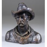 Manner of Frederic Remington (1861-1909) - Bronze - Portrait bust of a cowboy, bears signature, 4.