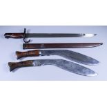 27. A WWII Japanese Bayonet, 15.5ins bright steel fullered blade marked with four circle motif,