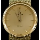 A 1980's Omega De Ville Quartz Wristwatch, 18ct Gold Cased, the gold dial with gold baton