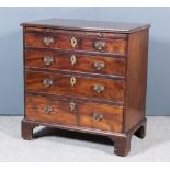 A George III Mahogany Chest of Small Proportions, with moulded edge to top, fitted with a brushing