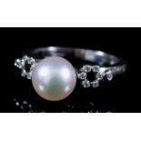 A Pearl and Diamond Ring, Modern, in 18ct white gold mount, set with cultured pearl, 8mm diameter,