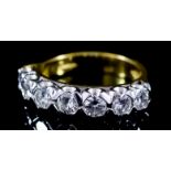 A Seven Stone Diamond Ring, Modern, in 18ct yellow gold mount, set with round brilliant cut