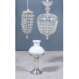 A Plated Metal Candle Lantern With an Opaque Glass Shade, 12.75ins high, and with gimbal wall