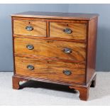 A Late Georgian Mahogany Chest, with moulded edge to top, fitted two short and two long drawers with
