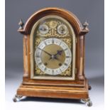 A Late 19th/Early 20th Century Oak Cased Mantel Clock, by Winterhalder & Hofmeier, the arched dial