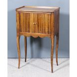 A Continental Stained Wood Tray Top Bedside Cabinet, enclosed by tambour shutter, on slender