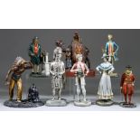 Eight Painted Metal Figural Table Lighters, Early 20th Century, including rug seller and camel, 7.