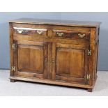 A Modern Panelled Oak Dresser Base of "18th Century" Design, with plain top, fitted two frieze