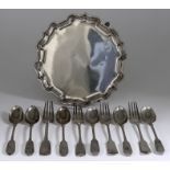 An Edward VII Silver Circular Salver, Six Victorian Silver Fiddle Pattern Dessert Spoons, and Four