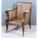 A George III Mahogany Square Back Bergere Armchair, with quadruple reeded framing and cane