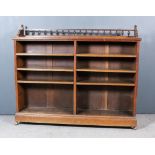 A Late Victorian Oak Dwarf Open Front Bookcase, with spindle turned gallery to back, fitted six