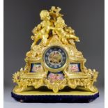 A Late 19th Century French Ormolu and Porcelain Mounted Figural Mantel Clock, signed Robelin of