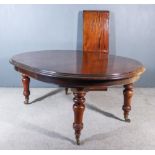A Victorian Mahogany Circular Extending Dining Table, with two extra leaves for same, with deep