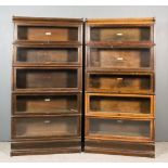 A Pair of 1920's Globe Wernicke Oak Five Tier Sectional Bookcases, with glazed rising fronts and