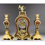 A 19th Century French Red Tortoiseshell, Boulle and Gilt Brass Mounted Mantel Clock of "Louis XV"