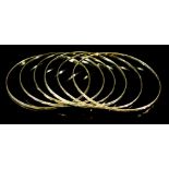 Six 14ct Gold Stiff Bangles, total gross weight 23g