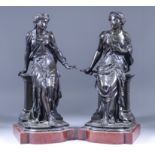 Late 19th Century Continental School - Pair of dark green patinated bronzes - seated figures of