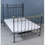 A Late Victorian 4ft 6ins Black Painted and Lacquered Brass Bedstead, with turned knop finials,