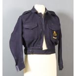 A Woman's Civil Defence Blouse, C.D.24, size 6, with label for L. Silberstone & Sons Ltd., 1955, a