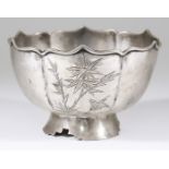 An Early 20th Century Chinese Silver Circular Bowl, with shaped and moulded rim, the lobed sides