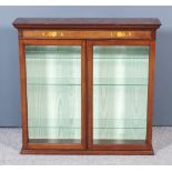 A Modern Mahogany Wall Mounted Display Cabinet, the frieze inlaid with floral marquetry, the