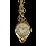 A Lady's Rotary Wristwatch, 20th Century, 9ct Gold Cased, the champagne dial with Arabic and baton