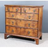 An 18th Century Walnut Chest, the top and drawer fronts with matched veneer panels and inlaid with