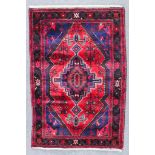 A Rug of Hamadan Design, Modern, woven in colours with central pole medallion, the field filled with