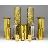 A Small Collection of Primarily World War I Brass Trench Art, including a pair of vases with an