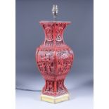 A Chinese Cinnabar Lacquer Baluster-Shaped Vase of Panelled Form, deeply carved with figures in