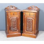 A Pair of Walnut Bedside Cabinets in the "Victorian" Manner, with shaped backs and moulded edges,