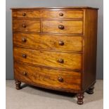 A Victorian Mahogany Bowfront Chest of Large Proportions, fitted one narrow frieze drawer, two short