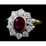 A Ruby and Diamond Ring, Modern, in 18ct yellow gold mount, the centre set with a ruby,